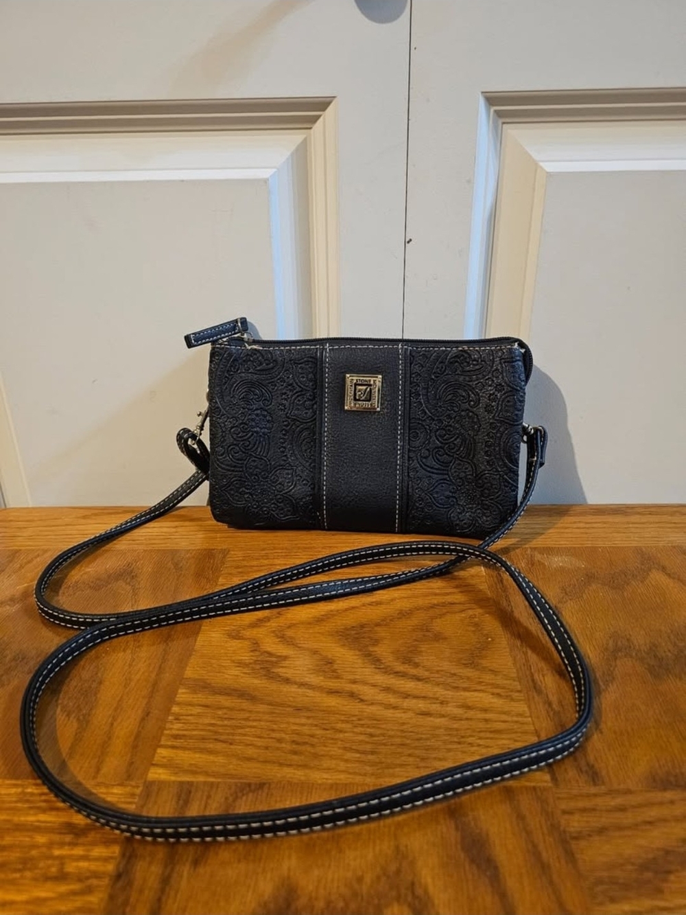 Stone Mountain Black Embossed Leather Crossbody Bag with Contrast Stitching